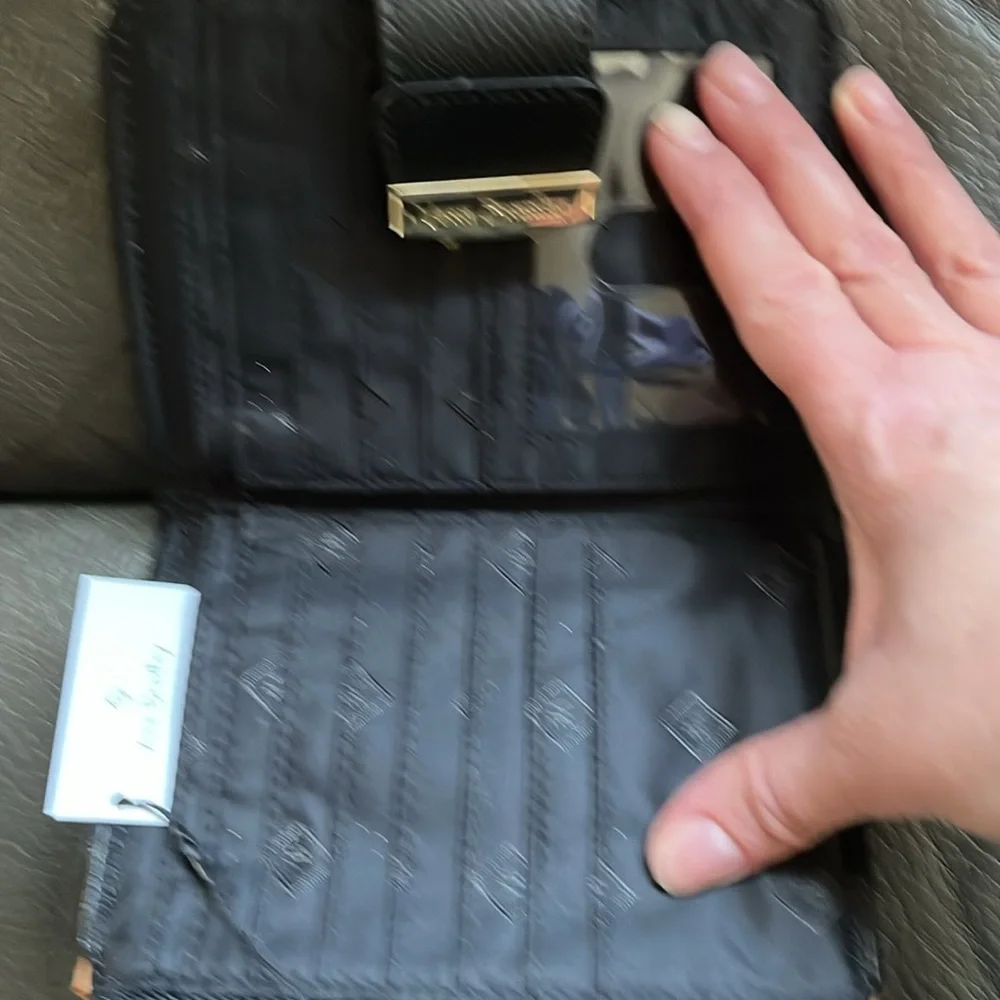 Vera Bradley Pushlock wallet in modern lights with black leather trim